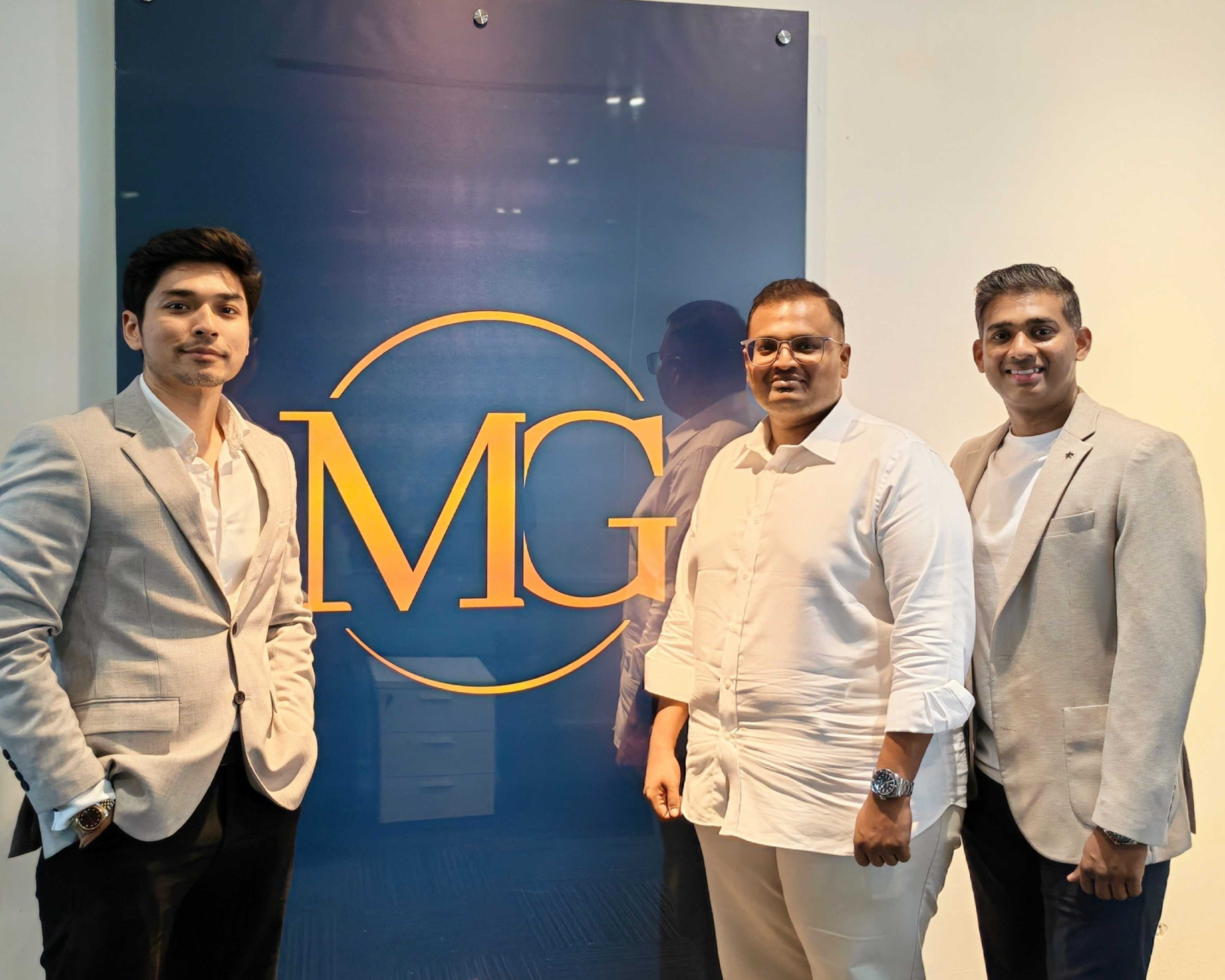 MG Gold Fintech leadership team at the MG Gold office